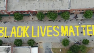 Tulsa Protesters Place Symbolic Tombstones With Names of Black Wall Street Victims on Black Lives Matter Mural in Last-Ditch Effort to Stop Its Removal
